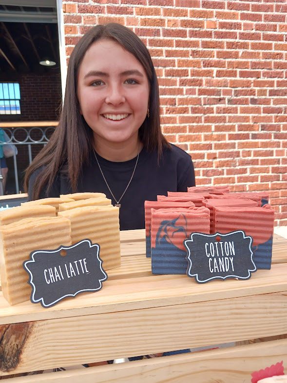 Scholarship Vendor Displaying Handmade Soaps